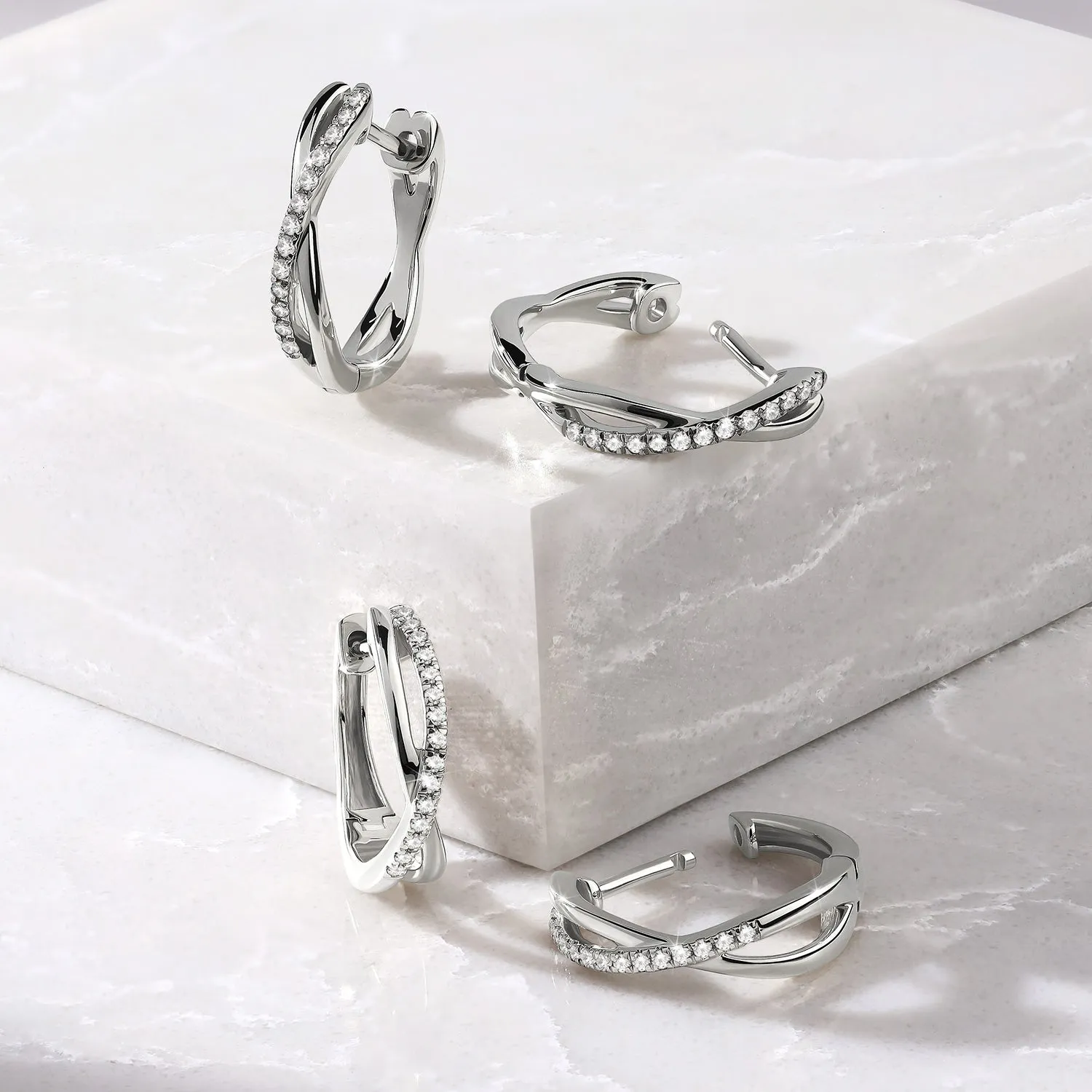 Enchanting Twisted Huggie Hoops