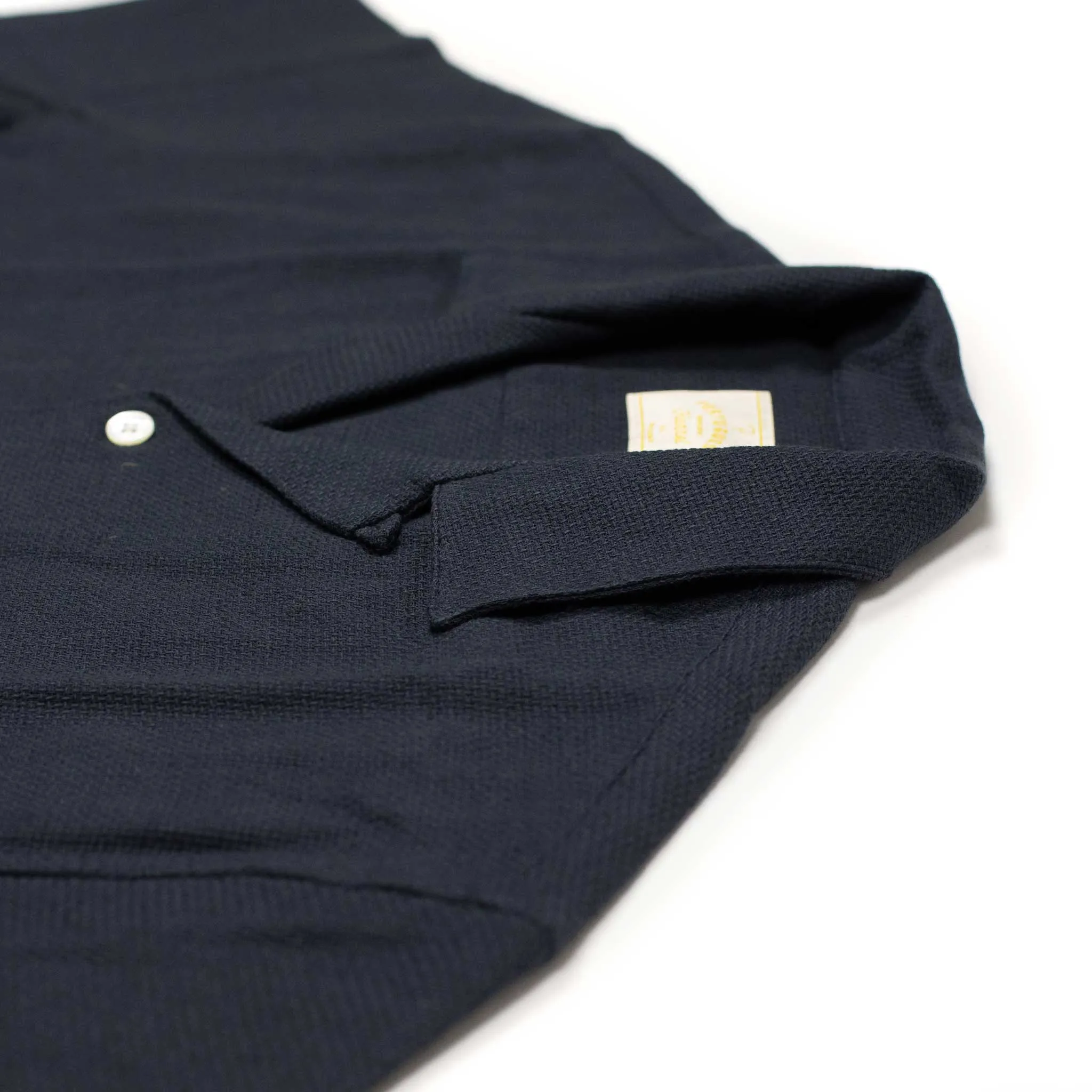 Pique camp collar shirt in navy with floral pocket embroidery